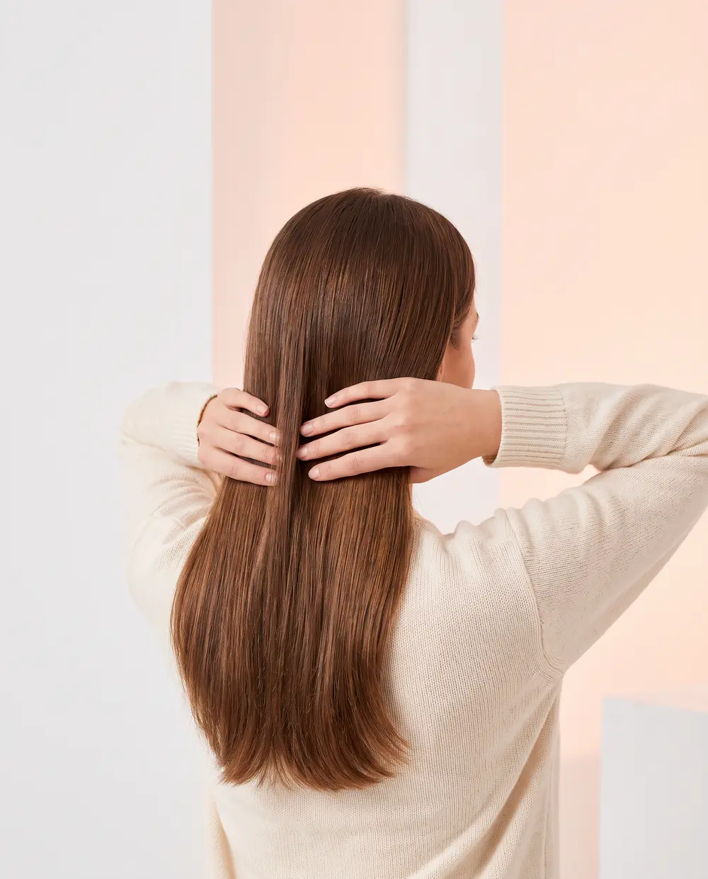 Smoothing oil through long, glossy lengths